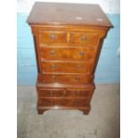 A SMALL REPRODUCTION CHEST OF DRAWERS, CHEST ON CHEST STYLE MADE BY CAVES AND SON OF BIRMINGHAM