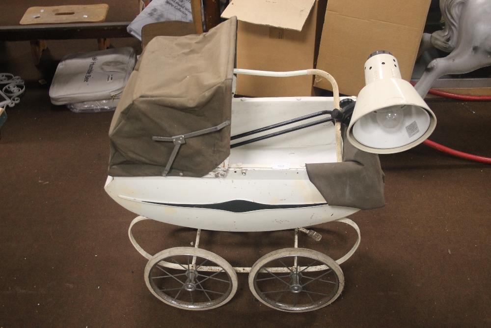 A TRIANG DOLLS PRAM AND AN ANGLE POISE LAMP