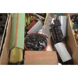 TWO TRAYS OF MODEL RAILWAY TO INCLUDE TIN PLATE ENGINE, CARRIAGES, STATION AND TRACK