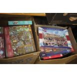 A LARGE QUANTITY OF BOXED JIGSAWS