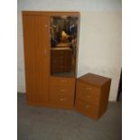 A TEAK EFFECT COMBINATION WARDROBE AND CHEST OF 3 DRAWERS