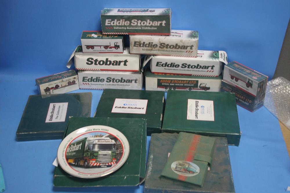 A COLLECTION OF EDDIE STOBART WAGONS AND EDDIE STOBART COLLECTORS PLATES