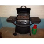 A NEW YORK GAS 3 BURNER BBQ