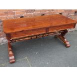 A 19TH CENTURY MAHOGANY LIBRARY TABLE, having two frieze drawers below a shaped rectangular top,