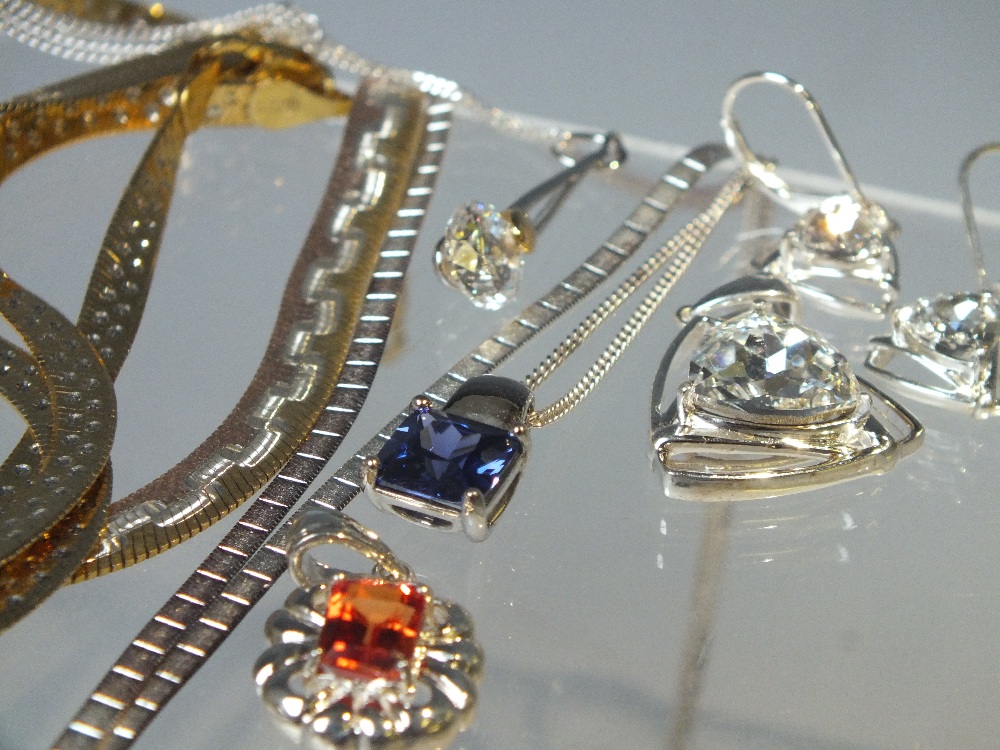 A COLLECTION OF MODERN SILVER JEWELLERY ITEMS, to include three pendant and earring sets (lacking