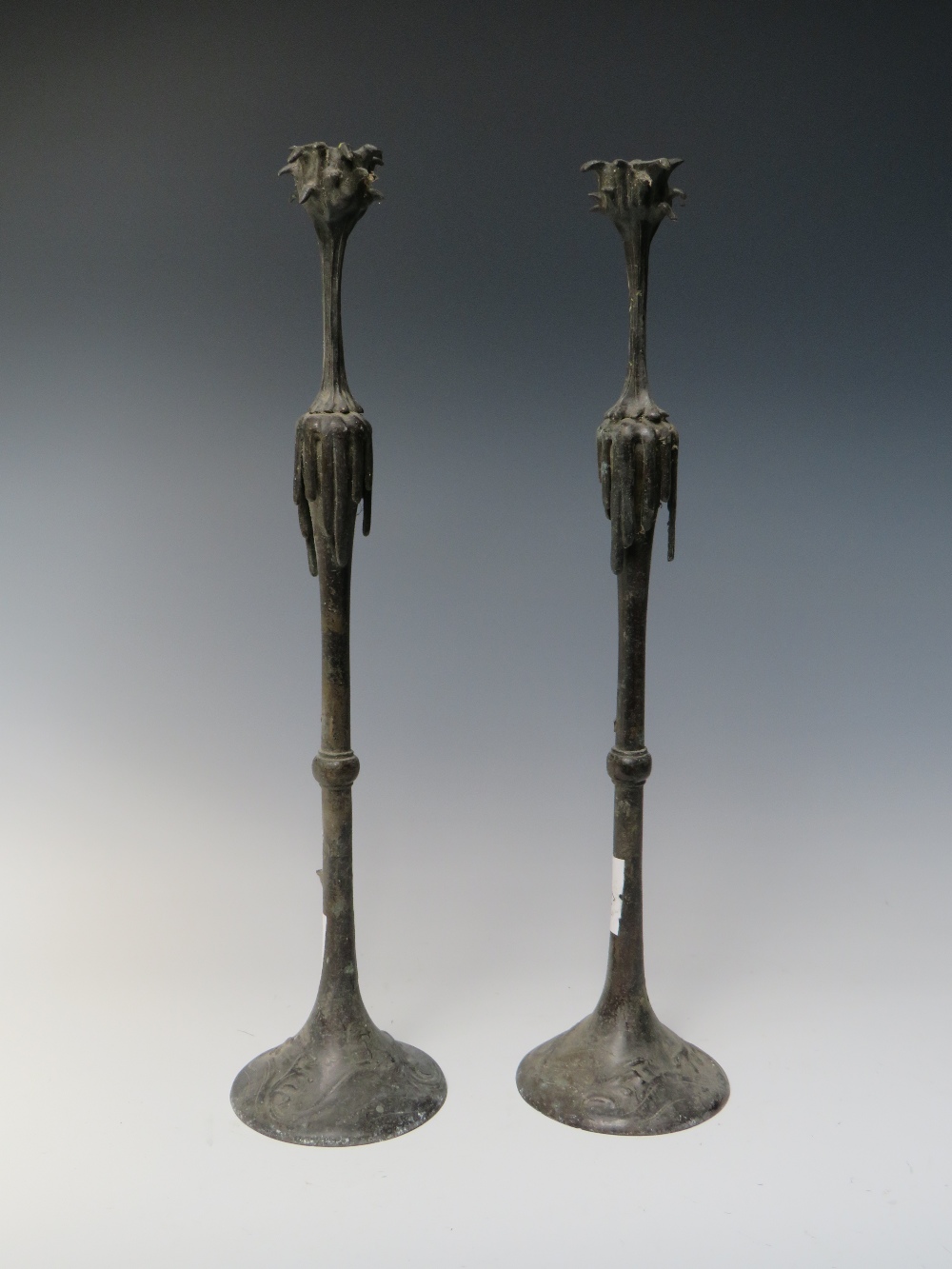 A PAIR OF ORIENTAL BRONZE TAPER CANDLESTICKS, unmarked, H 41 cm