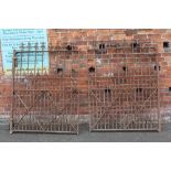 A SET OF LARGE HEAVY WROUGHT IRON GATES, each gate H 166 cm, W 123 cm