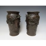 A PAIR OF ANTIQUE CHINESE BRONZE BALUSTER VASES DECORATED WITH DRAGONS IN RELIEF, H 24 cm