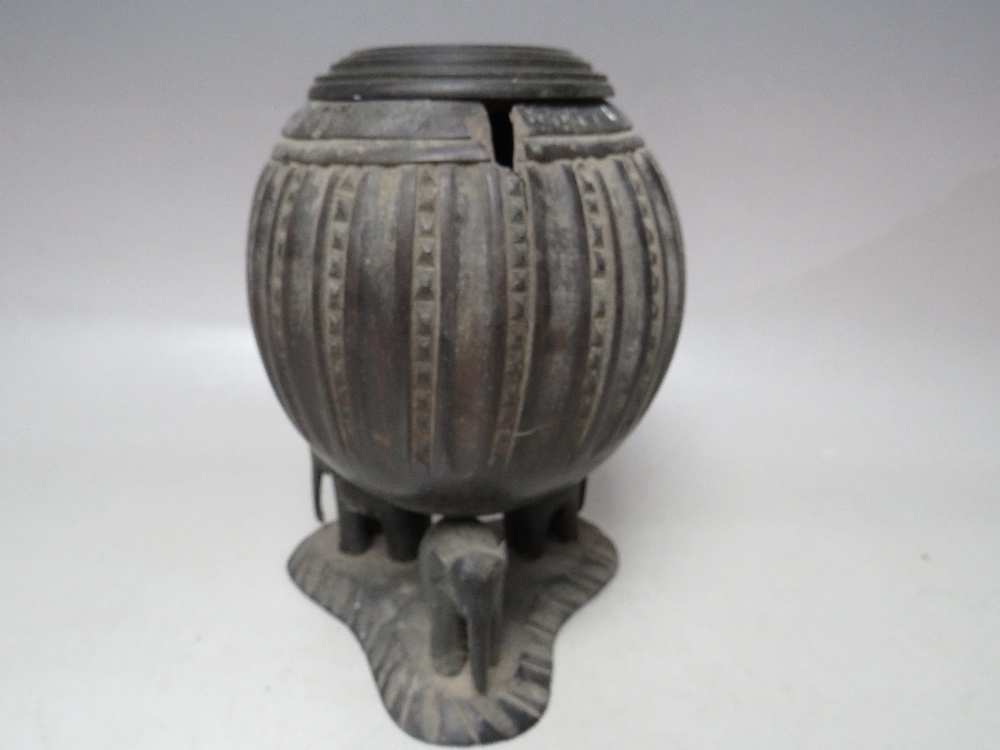 A 19TH CENTURY CARVED COCONUT SHELL AND LID, raised on a white metal covered support, H 23 cm, - Image 6 of 10
