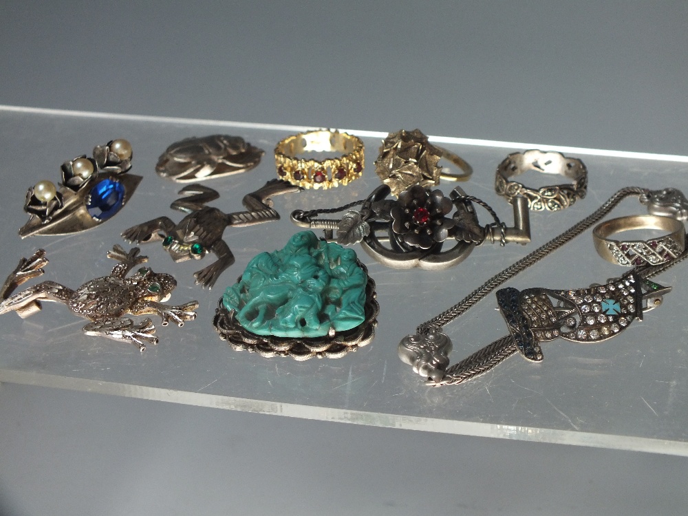 A COLLECTION OF VINTAGE AND SILVER COSTUME JEWELLERY, to include a selection of silver brooches, two