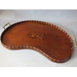 AN EDWARDIAN MAHOGANY INLAID KIDNEY SHAPED TRAY, with twin brass handles, W 60 cm