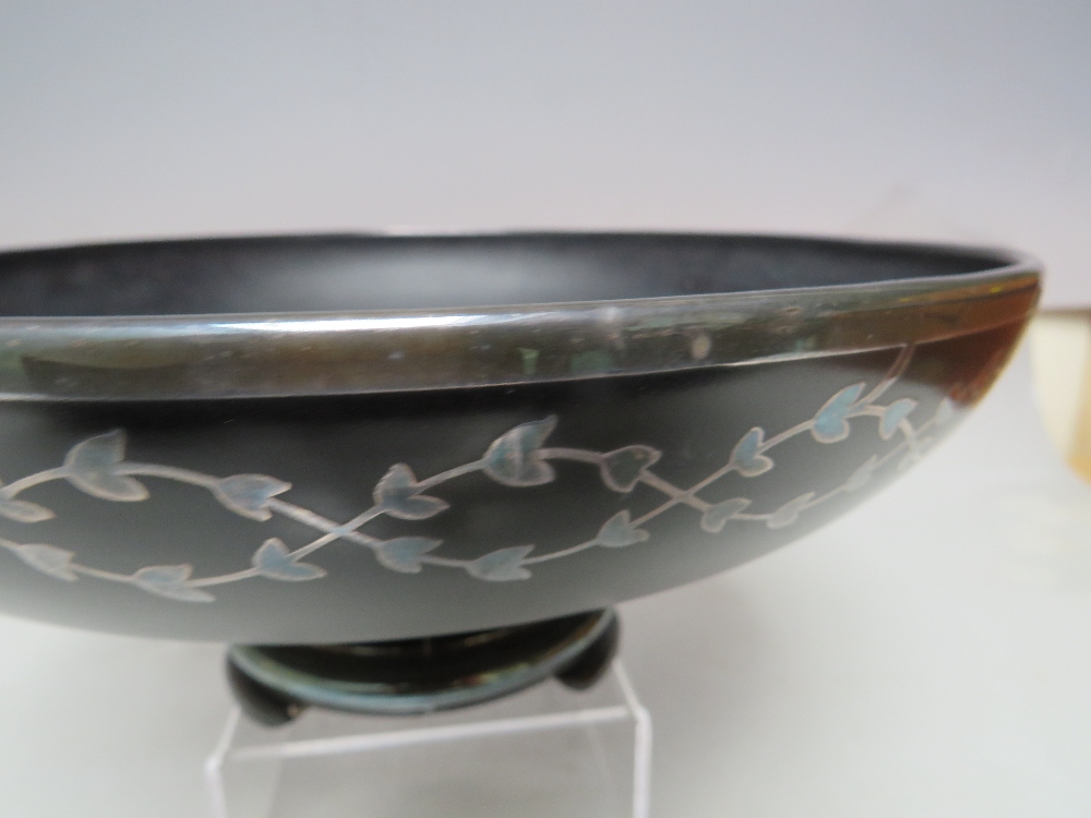 AN EARLY TO MID 20TH CENTURY FOOTED BLACK GLASS BOWL WITH WHITE METAL INLAY, of circular form with - Image 4 of 9