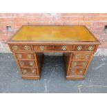 A SMALL LATE VICTORIAN / EDWARDIAN MAHOGANY TWIN PEDESTAL DESK, with tooled leather writing