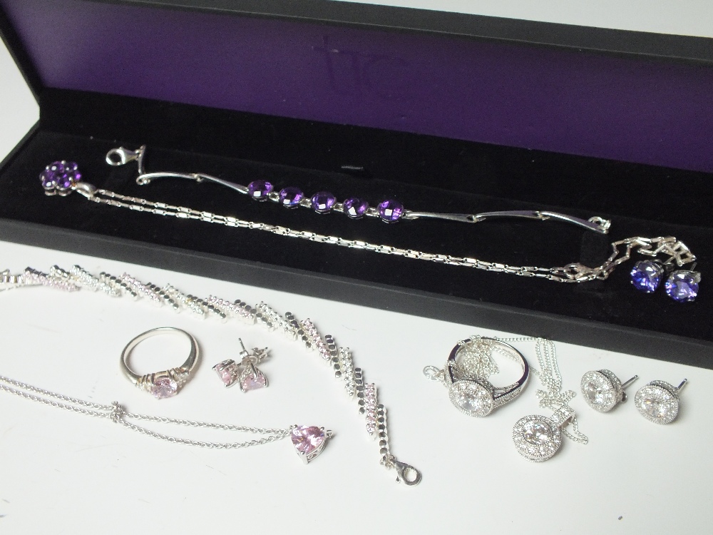 THREE MODERN SILVER GEMSET JEWELLERY SETS, to include QVC Diamonique examples