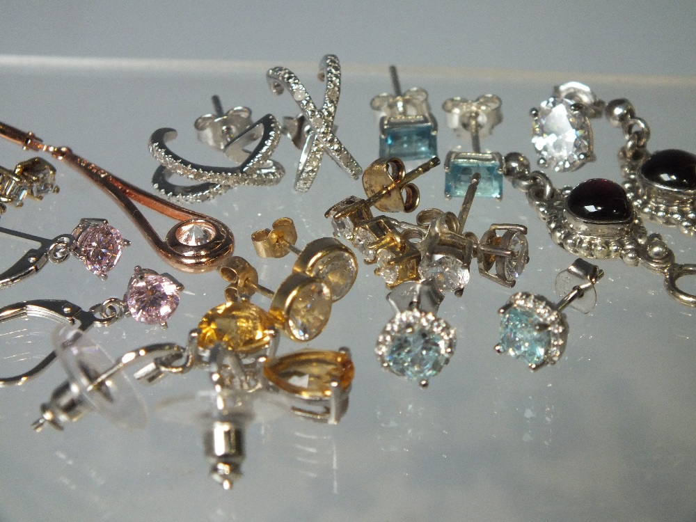 A COLLECTION OF MODERN SILVER EARRINGS, to include QVC Diamonique examples (Approx 45)