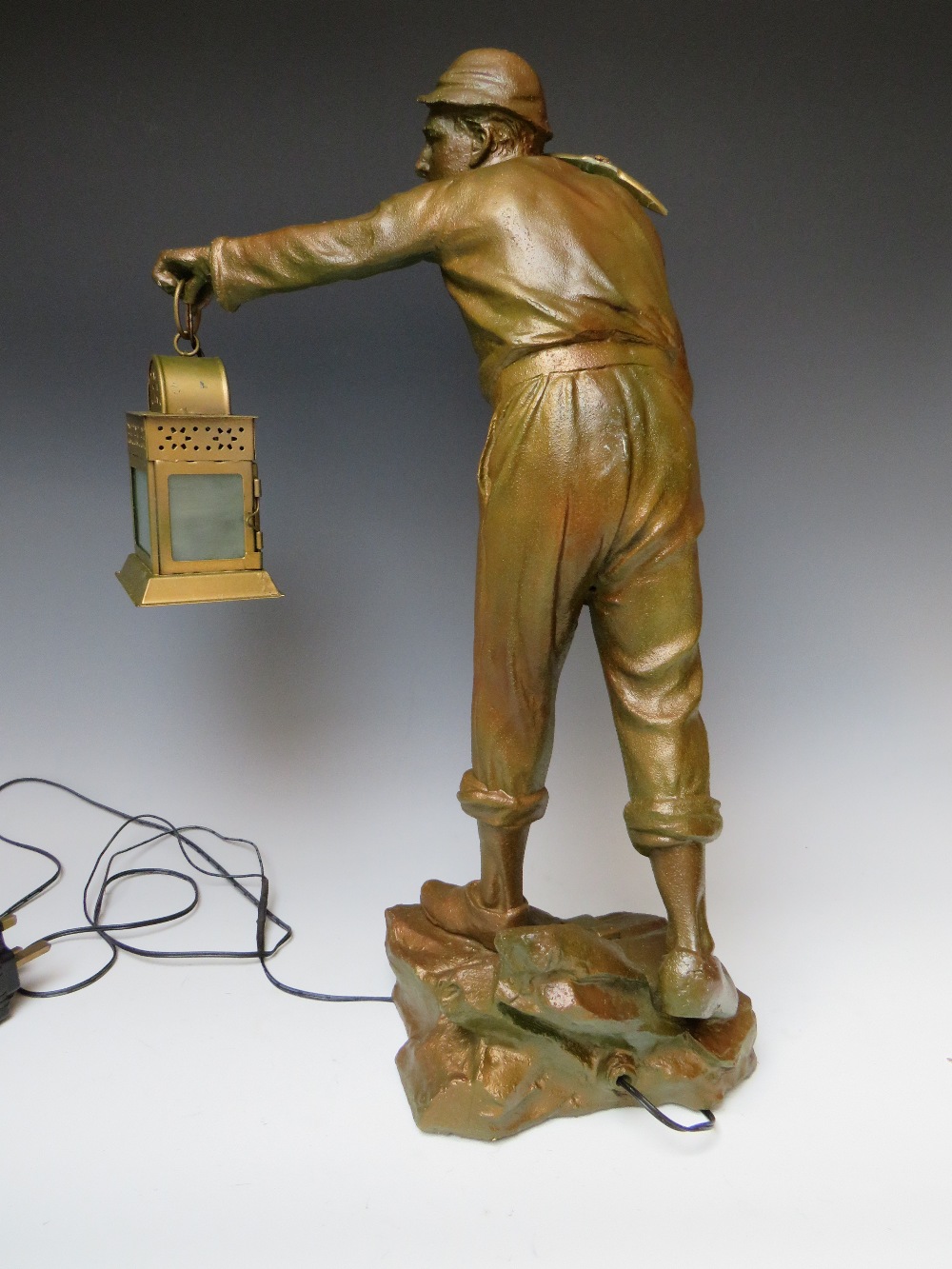 A LARGE SPELTER FIGURE OF A MINER WITH LAMP, the lamp fitted with later LED bulb, H 53 cmCondition - Image 7 of 8