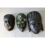 THREE WEST AFRICAN NIGERIAN IBIBIO WOODEN TRIBAL ART FACE MASKS