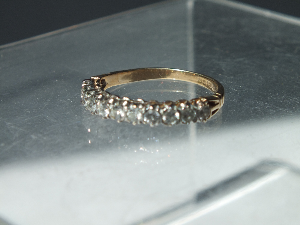 A 9CT GOLD AND CUBIC ZIRCONIA ETERNITY STYLE RING, together with a 9ct gold band set with six - Image 3 of 4