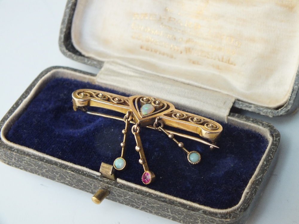 A 9CT GOLD OPAL AND GEMSET BAR BROOCH, of ornate design with gemset droppers, approx 4.1 g, W 4 cm - Image 3 of 3