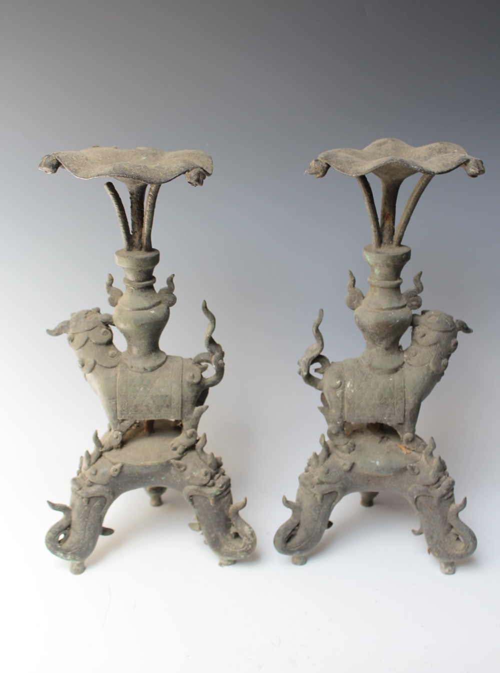 A PAIR OF 19TH CENTURY CAST BRONZE FOO DOG STANDS, each raised on three scrolling feet with foo - Image 6 of 6