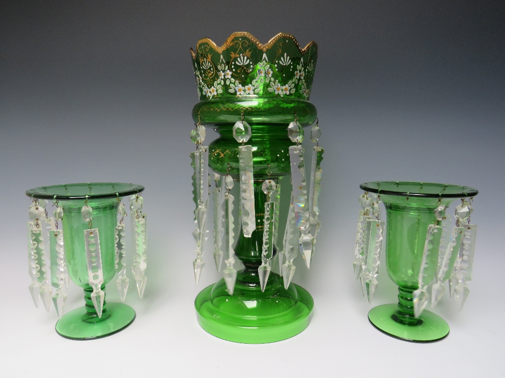 A LATE 19TH CENTURY GREEN GLASS AND ENAMEL LUSTRE, H 36.5 cm, together with two smaller plain