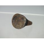 A BRONZE ROMAN HEAD SEAL RING TOP, on later brass ring with additional white metal insert