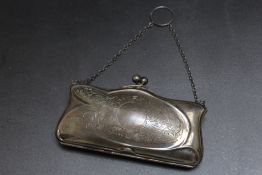 A HALLMARKED SILVER PURSE BY G NORMAN - BIRMINGHAM 1918, with fitted interior and on a ring