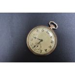 AN OPEN FACED MANUAL WIND SLIMLINE POCKET WATCH, in yellow metal, can't remove back cover, ticks