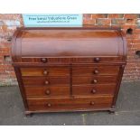 A 19TH CENTURY MAHOGANY CYLINDER BUREAU OF LARGE PROPORTIONS, the cylinder front revealing a