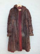 A VINTAGE FUR SHRUG WITH FRONT POCKETS, together with a vintage fur stole, both fully lined, plus