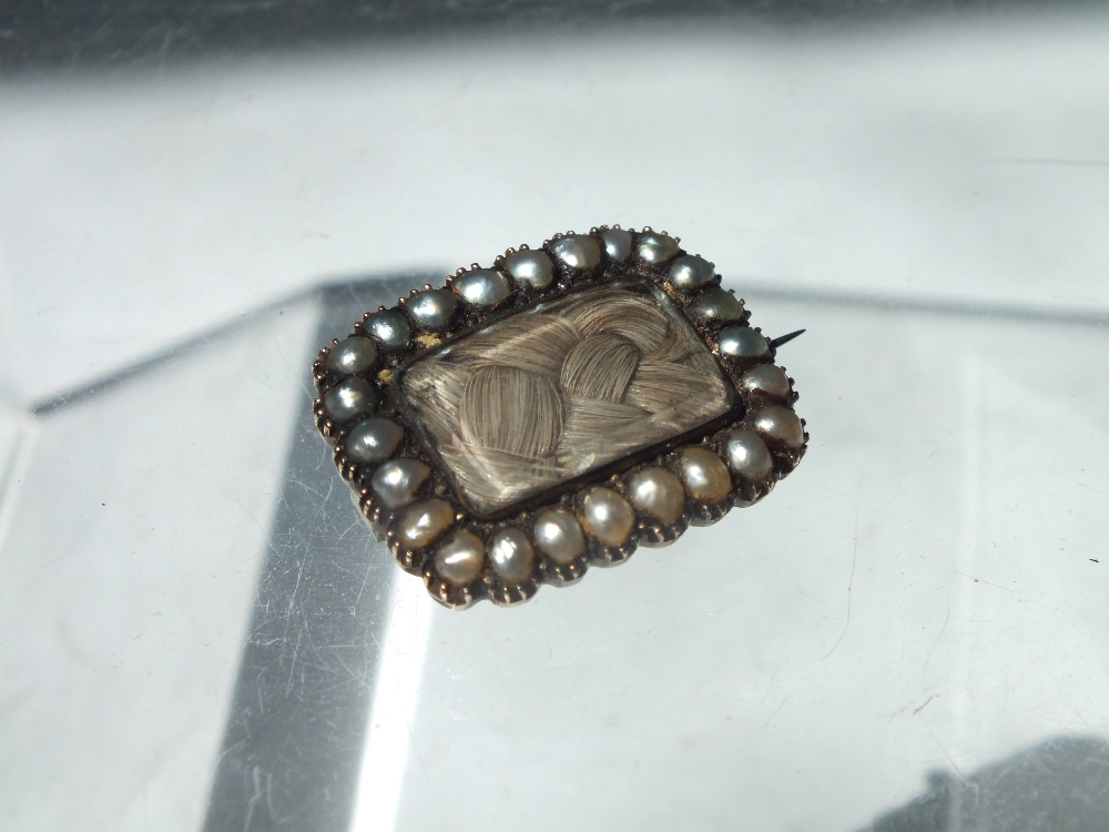 FOUR ANTIQUE MOURNING BROOCHES, varying styles and designs, to include a Victorian large yellow - Image 4 of 9