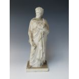 A COPENHAGEN PARIAN WARE FIGURE OF ST PETER HOLDING THE KEYS TO THE GATES OF HEAVEN, base signed