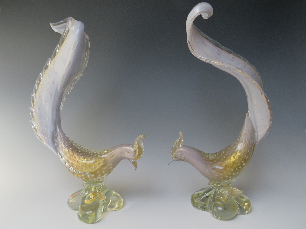 A PAIR OF MURANO BIRD OF PARADISE GLASS SCULPTURES, circa 1950, lilac and clear glass body with gold