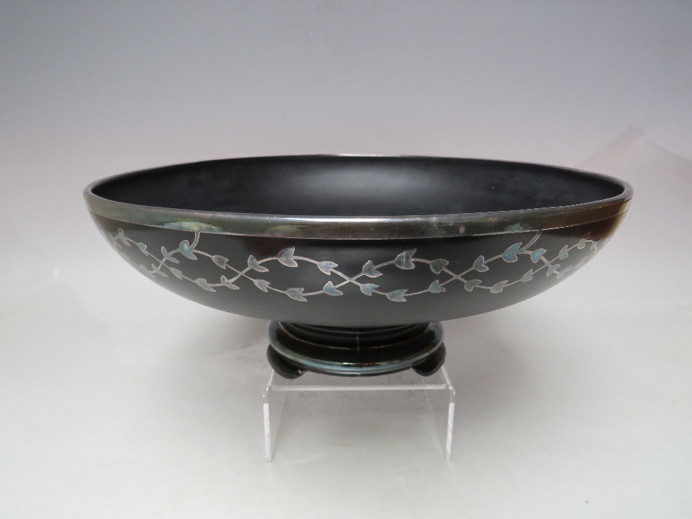 AN EARLY TO MID 20TH CENTURY FOOTED BLACK GLASS BOWL WITH WHITE METAL INLAY, of circular form with - Image 3 of 9