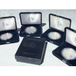 FOUR CASED SILVER AMERICAN EAGLE ONE DOLLAR COINS, one ounce proof silver bullion coins,