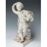 A SEVRES WHITE BISQUE PARIAN FIGURE OF A BOY PERFORMER, the figurine with cloak and hat,