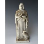 A COPENHAGEN PARIAN WARE FIGURE OF ST JOHN THE APOSTLE WITH EAGLE, base signed to rear Eneret, H