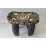 A WEST AFRICAN TRIBAL ART SENUFO IVORY COAST STOOL, with decorative bone inlays