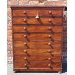 A LARGE VICTORIAN MAHOGANY CHEST OF DRAWERS, with a bank of eight long drawers, raised on circular