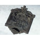 A CARVED RELIGIOUS WALL HANGING PLAQUE WITH HOLY WATER FONT, with figures in relief and Latin script