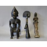 A WEST AFRICAN SENUFO SEATED FEMALE FIGURE, together with a Nigerian Yoruba female figure and