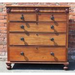 A MID VICTORIAN MAHOGANY CHEST OF DRAWERS, having two secret frieze drawers above an arrangement
