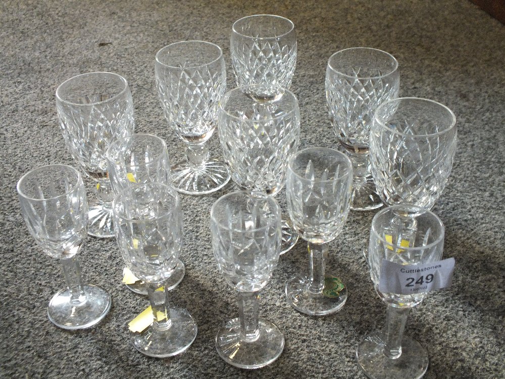 TWO SETS OF SIX WATERFORD CRYSTAL DRINKING GLASSES - H 10 CM AND 11 CM