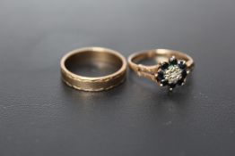 A HALLMARKED 9 CARAT GOLD WEDDING BAND, approx weight 2.3g, ring size M, together with a