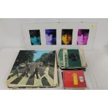 A COLLECTION OF THE BEATLES LP RECORDS, 7" SINGES AND CDS