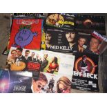 A QUANTITY OF FILM ADVERTISING POSTERS, FOOTBALL INTEREST POSTERS ETC