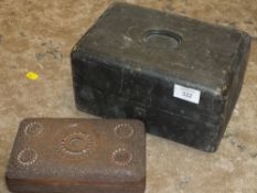 A VINTAGE LEATHER COATED JEWELLERY BOX, TOGETHER WITH A HEAVILY CARVED WOODEN BOX (2)