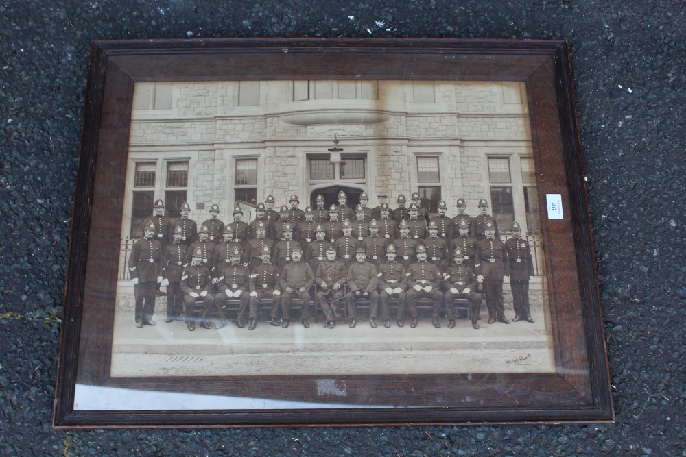 AN OAK FRAMED PRINT OF A POLICE SQUAD - Image 2 of 4