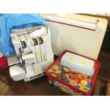 A SINGER 14 U132 OVERLOCKER, TOGETHER WITH A VINTAGE ELNA SEWING MACHINE AND ACCESSORIES