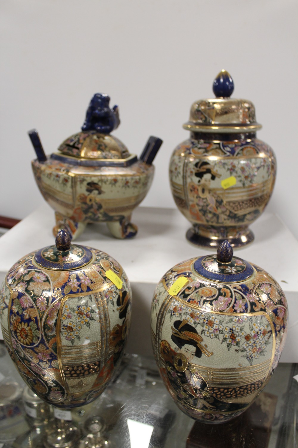 FOUR PIECES OF ORIENTAL LIDDED VASES